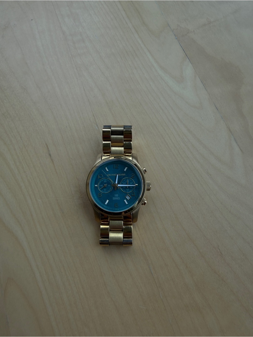 Michael Kors Gold Tone Watch with Blue Dial